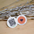 QR code pet id tag with red logo | Animal-id.net